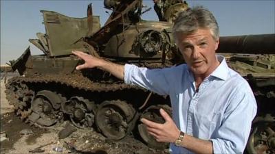 Tim Willcox with destroyed tank