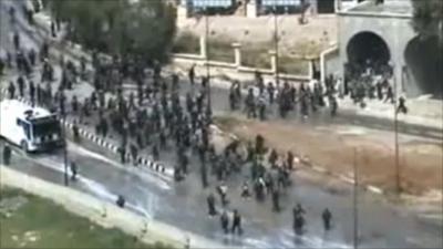 Screen grab from video on the internet that appears to show protesters and security forces