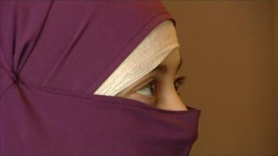 Woman wearing veil over face