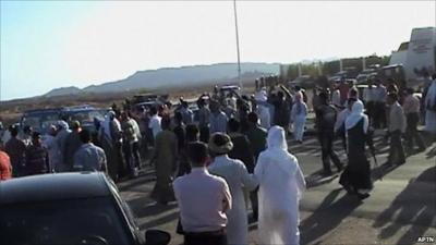 Protesters outside Mr Mubarak's hospital