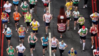 Runners cross Tower Bridge