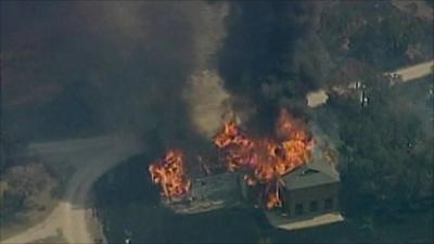 Building burning in Texas wildfire