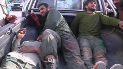 Gaddaffi forces in a rebel truck