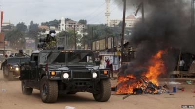 Military police patrol Kampala street