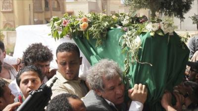 Libyans at Saif Al-Arab Gaddafi's funeral