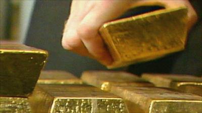 Stacking gold bars