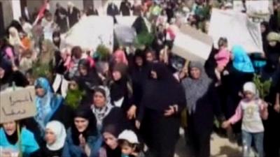 Women and children in Syria protesting