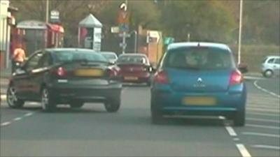 Two cars on road