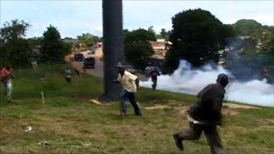 People fleeing tear gas