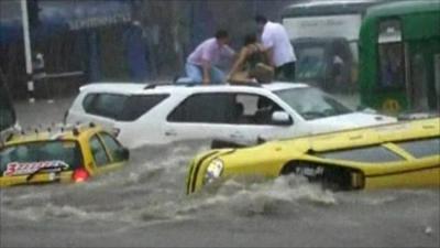 Cars swept away in Colombia floods