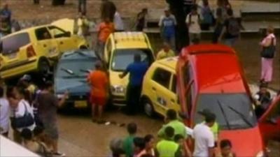 Cars piled up in Colombia floods