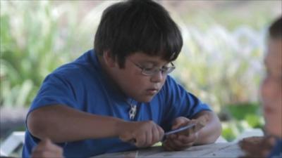 A student learns traditional crafts