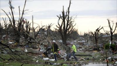 People searching the rubble