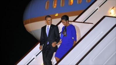 US President Barack Obama and First Lady Michelle Obama arrive at Stansted airport