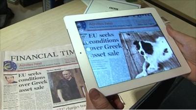 Viewing a newspaper through an augmented reality application