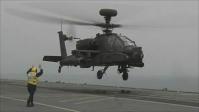 Apache helicopter takes off