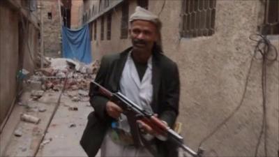 Man with gun in Yemen