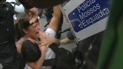 Police move protesters in Barcelona