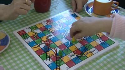 Patients playing board game