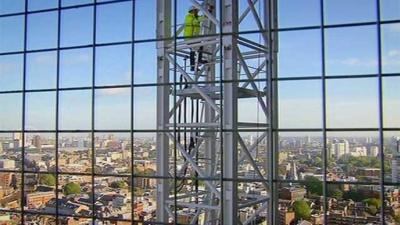 Andrew Marr climbs a crane to get above the Shard