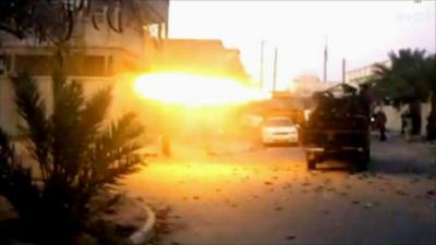 Ammunition being fired from back of a truck (library pictures)