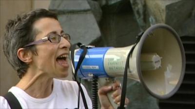 Protester uses loud hailer