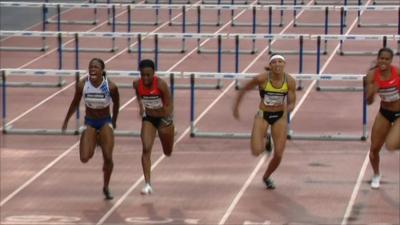 Danielle Carruthers wins the women's 100m hurdles