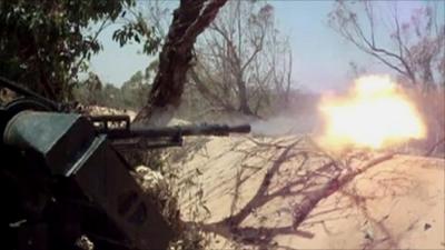 Rebel gun fire in Libya