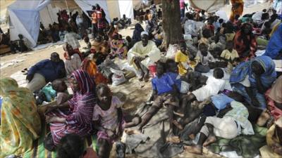 People in Kadugli town June 9, 2011