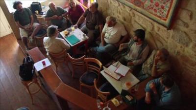 A group of people in a bar