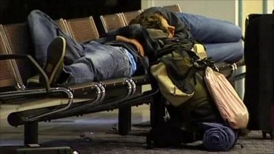 People sleeping in airport