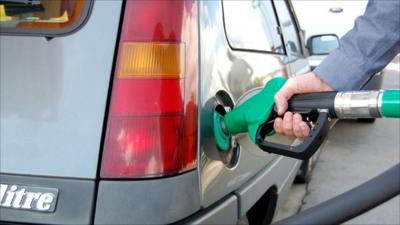 Car being filled with petrol