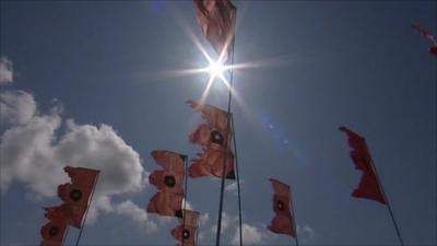 Flags flying at Glastonbury