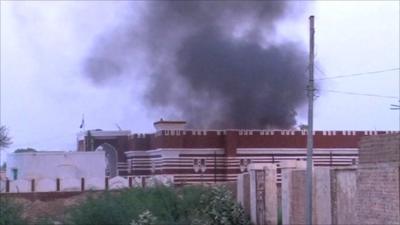Smoke rising from police station