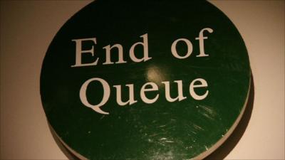 Queue sign