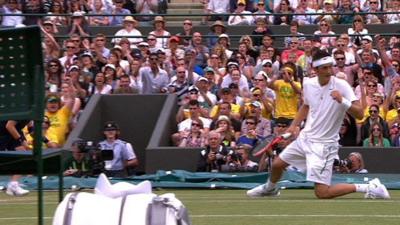 Bernard Tomic celebrates