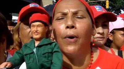 Woman with "Chavez" doll in Caracas