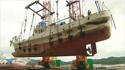 Boat being salvaged in Japan