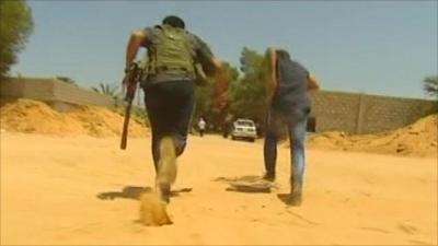 Libyan rebels running near front line