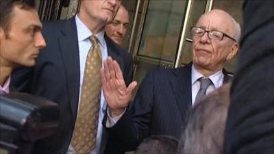 Rupert Murdoch after speaking with the Dowler family