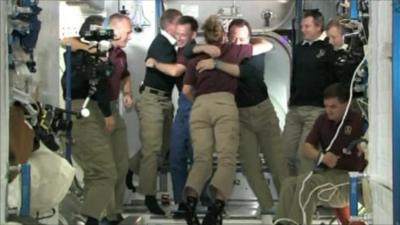 Atlantis crew say farewell to the crew of the ISS