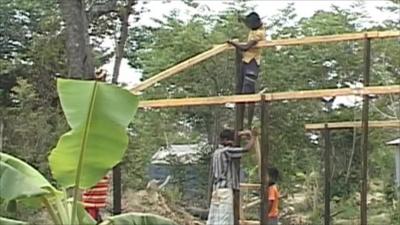 Men build house in Sri Lanka