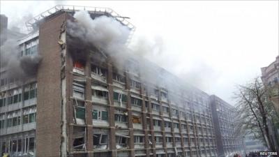 Smoke billowing from a building