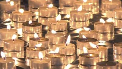 Candles at memorial ceremony