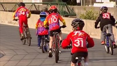 Children taking part in cycle race