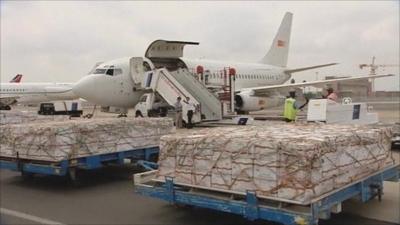 Aid supplies being loaded onto plane to assist in drought affected areas of Africa