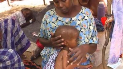 Mother and child in a refugee camp in East Africa