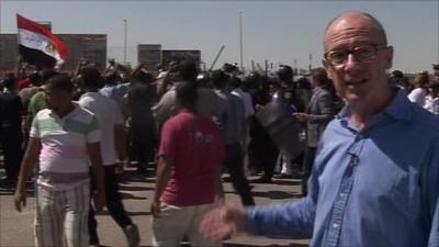 Jon Leyne watching protesters in Cairo