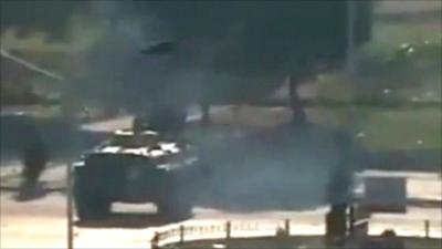 Video footage showing tank moving through Hama