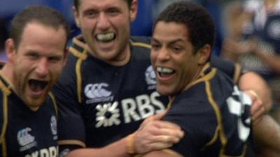 Scotland's Joe Ansbro celebrates scoring the game-winning try against Ireland